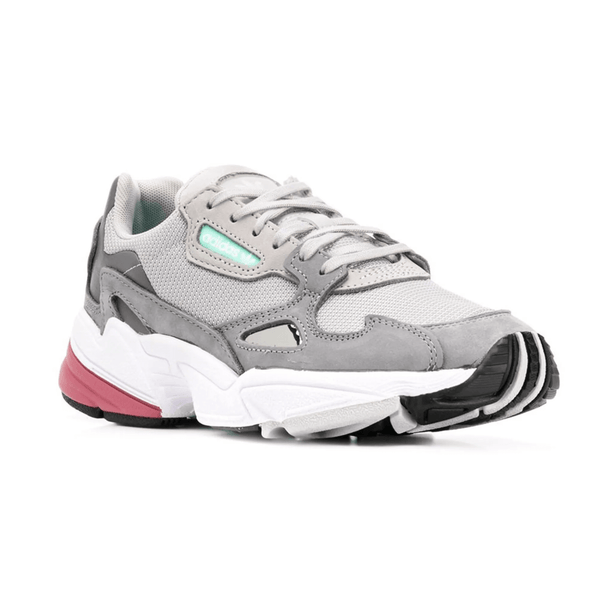 Adidas FALCON GREY Women sneaker featuring a grey leather upper and white rubber sole.